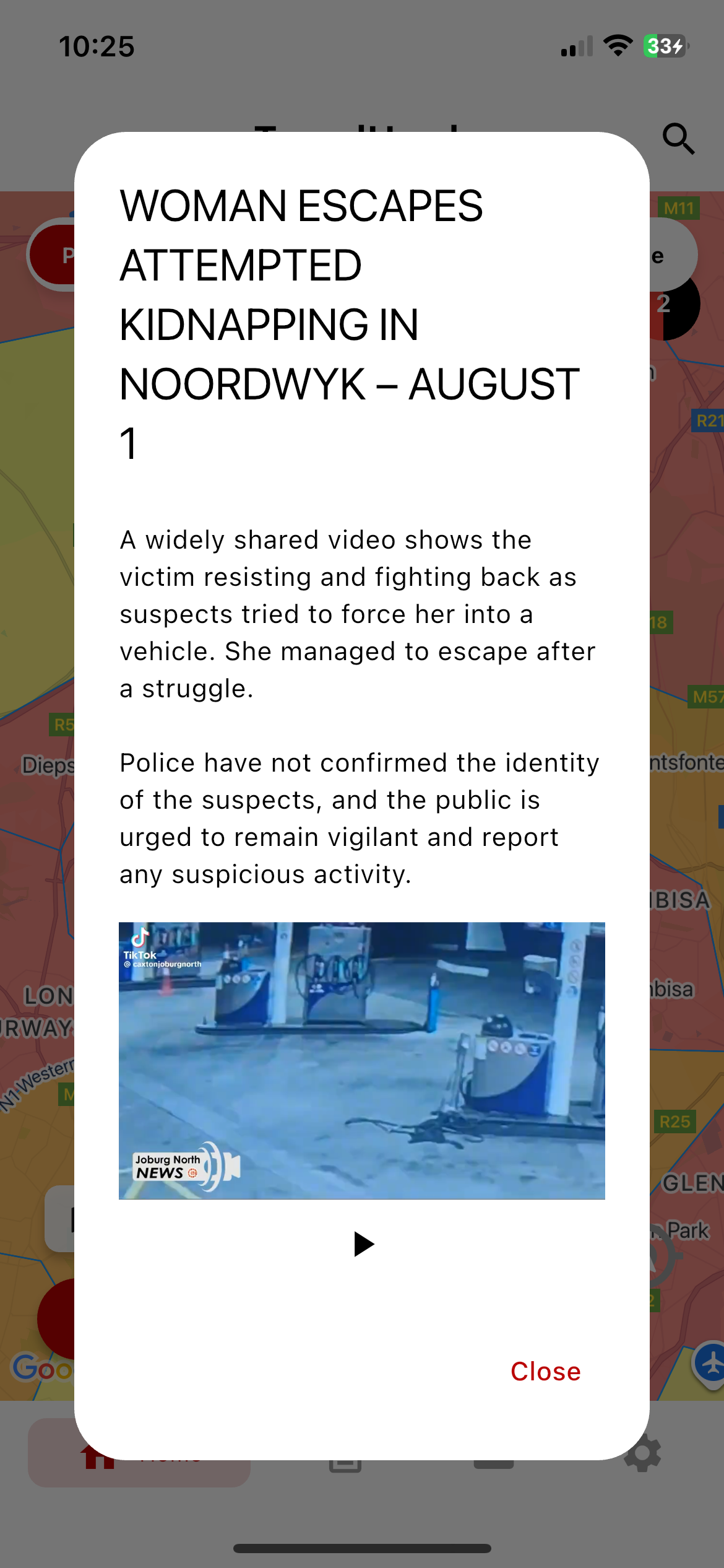 TravelHawk app showing a real-time community safety alert